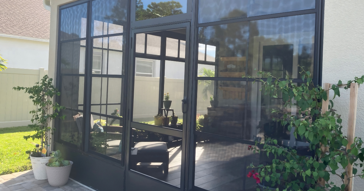 Florida lanai with custom screened windows and door